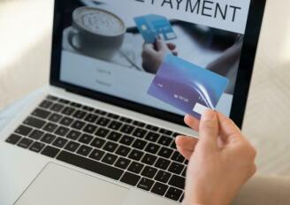 woman with credit card making online payment